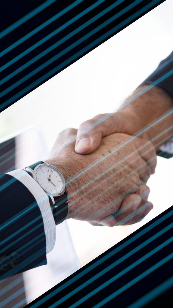 ATB株式会社と海外パートナーの握手による協力関係